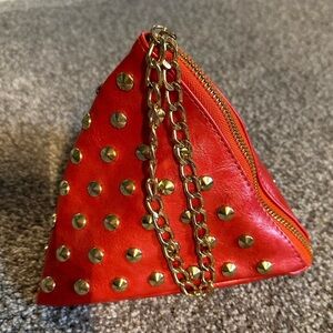 Pyramid studded wristlet